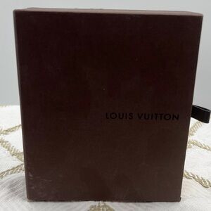 Empty Louie Vuitton belt box.